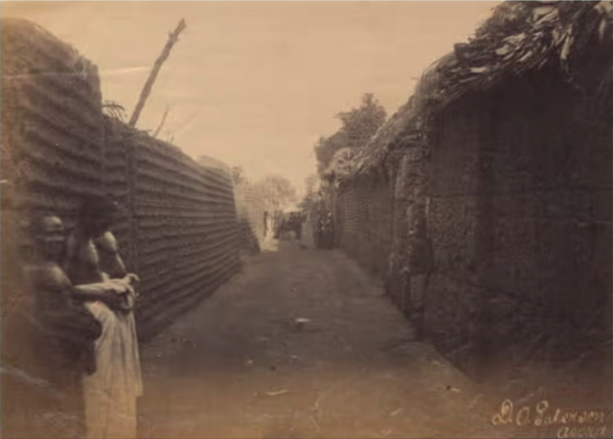 A Street Scene with Earthwork Structures in the Kingdom of Benin,
possibly captured in February 1891.